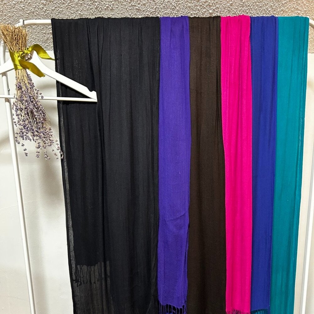 Bundle of multi-colored cotton scarves